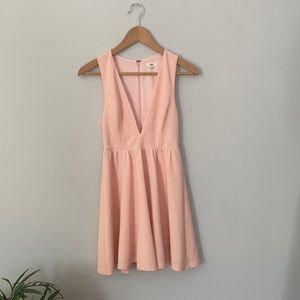 Cocktail Dress with plunging neckline by Lucca